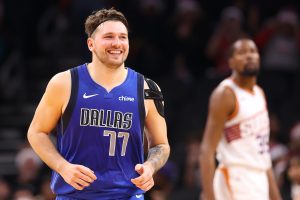 PHOENIX, ARIZONA - DECEMBER 25: Luka Doncic #77 of the Dallas Mavericks reacts during the final moments of the NBA game against the Phoenix Suns at Footprint Center on December 25, 2023 in Phoenix, Arizona. The Mavericks defeated the Suns 128-114. NOTE TO USER: User expressly acknowledges and agrees that, by downloading and or using this photograph, User is consenting to the terms and conditions of the Getty Images License Agreement. (Photo by Christian Petersen/Getty Images)